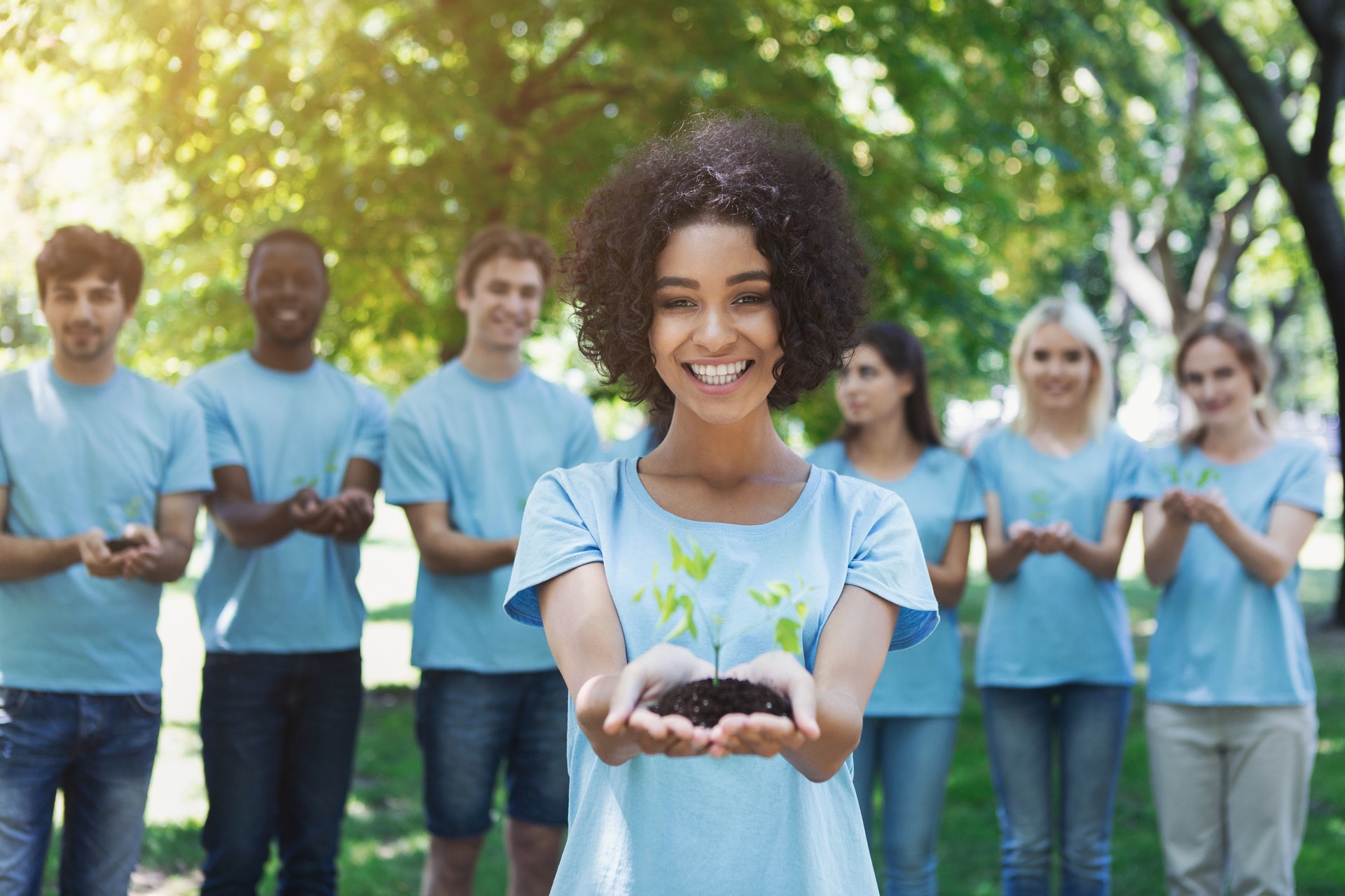 Group of volunteer with trees for growing